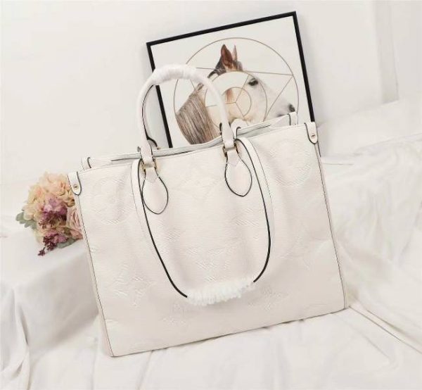 Replica Louis Vuitton Monogram Empreinte Giant Onthego GM Tote In Cream