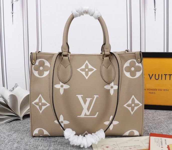 Replica Louis Vuitton Monogram Empreinte Leather OnTheGo MM Tote In Tourterelle Gray