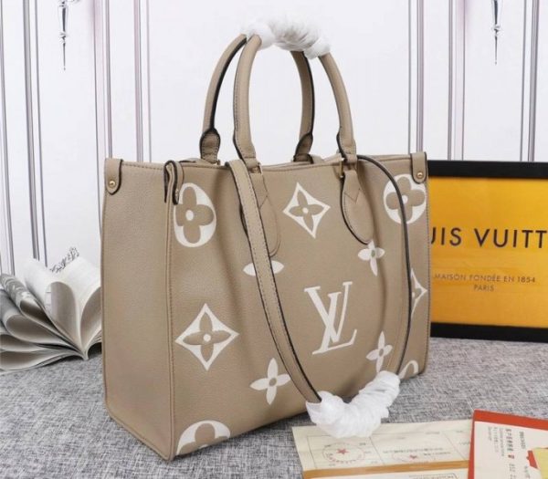 Designer Louis Vuitton Monogram Empreinte Leather OnTheGo MM Tote In Tourterelle Gray