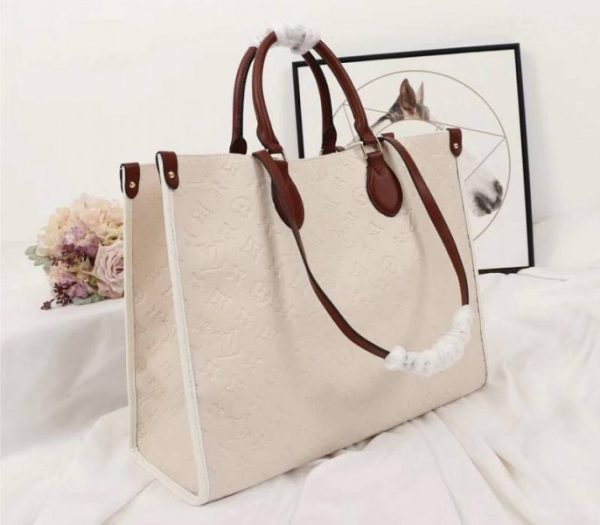 Designer Louis Vuitton Monogram Empreinte Onthego GM Tote In Cream